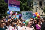 Tens of thousands of people flocked to Northwest Portland Sunday for the city's annual Pride Parade and Festival Sunday, June 19, 2016. Many carried signs or wore buttons in honor of the lives lost in a tragic mass shooting at an Orlando gay nightclub just a week earlier.