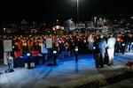 Members of the West Virginia public safety community attend a candlelight vigil for Staff Sgt. Andrew Wolfe outside of the Berkeley County Sheriff's office on Wednesday.