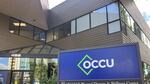 The exterior of a building with a sign that reads OCCU.