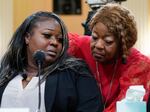 Wandrea "Shaye" Moss, a former Georgia election worker, is comforted by her mother Ruby Freeman, right, at a hearing before the the House select committee investigating the Jan. 6 attack on the U.S. Capitol on June 21, 2022.