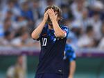 Luka Modric of Croatia reacts the World Cup semifinal match between Argentina and Croatia.