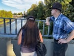 Steve Cameron, right, looks out at the Moore and Wright Island Natural Area within the Columbia Slough in Portland, Ore., on July 29, 2025.
