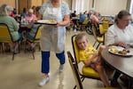Families dine at the James 2 Community Kitchen,  Aug 1, 2026.