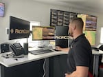 PacifiCorp Wildfire Intelligence Center staff member Zylon De La Torre checks the cameras on ALERTWest.