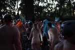 Nude riders wait to get on the road at the 13th Annual World Naked Bike Ride in Mount Scott Park in Portland, Ore. on Saturday, June 25, 2016.