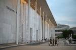 National Guard troops patrolling outside the Kennedy Center on June 28. The entryway of the Washington, D.C. arts complex continues to be covered with a tarp after a federal judge ordered the organization's board to remove signage that included President Trump's name.