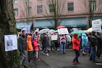 Demonstrators march through the rain at Women's March Portland on Saturday, Jan. 21, 2017.