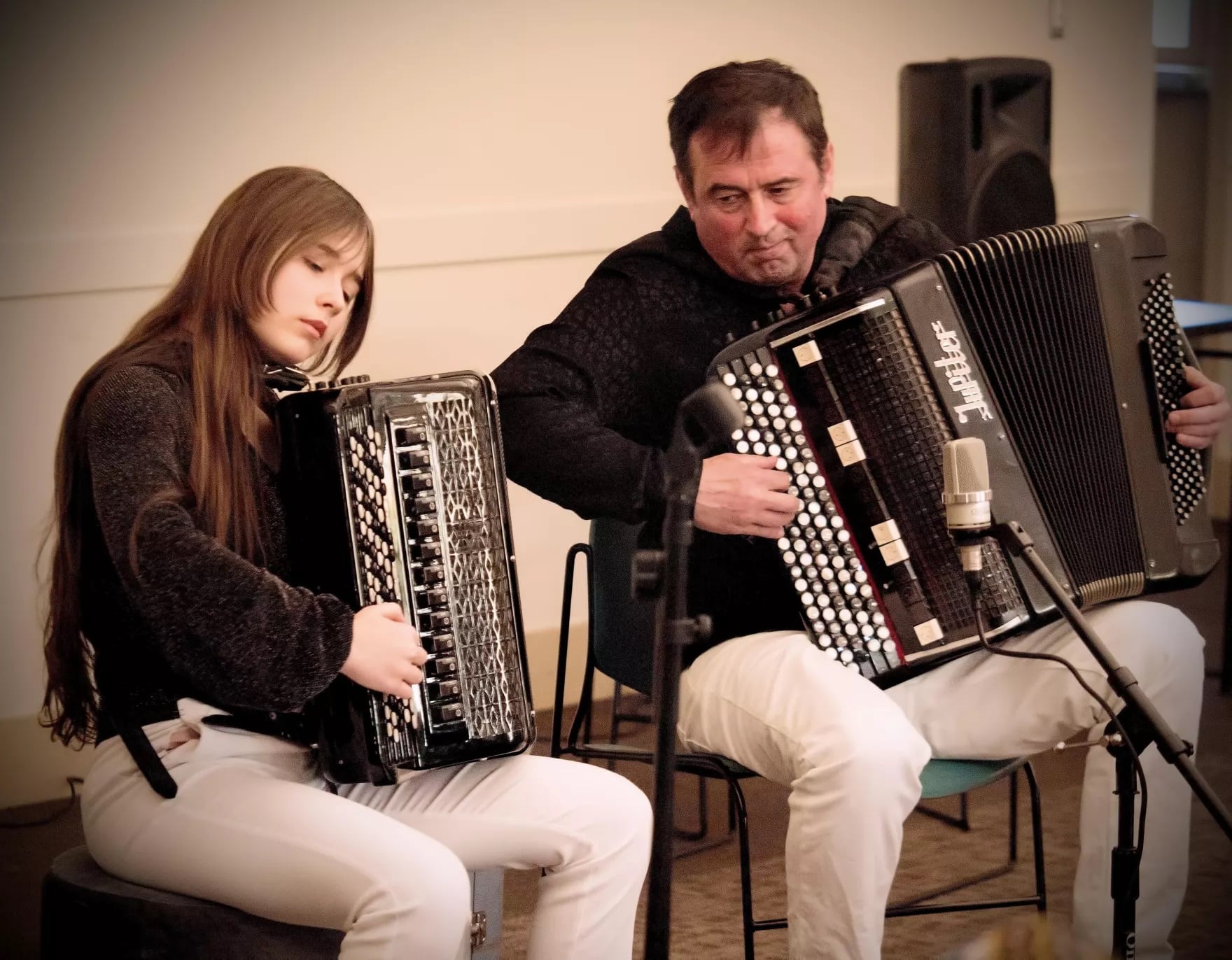 Maria and her father, Sergei, playing as a duo at the San Francisco Accordion Club.