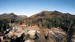 Three fires converged in 2020, destroying over 1,500 structures in the Santiam Canyon, which included massive destruction to the city of Detroit, shown here. Any wildfire-related settlement payments survivors of powerline-ignited fires receive beginning in 2026 will again be subject to federal income taxes.