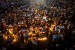 An aerial image shows Catholic believers holding candles during Pope Francis's requiem mass at the Esplanade of Tasitolu in Dili, East Timor, where he held a Mass in September last year, on April 26, 2025, as his funeral takes place in Vatican.