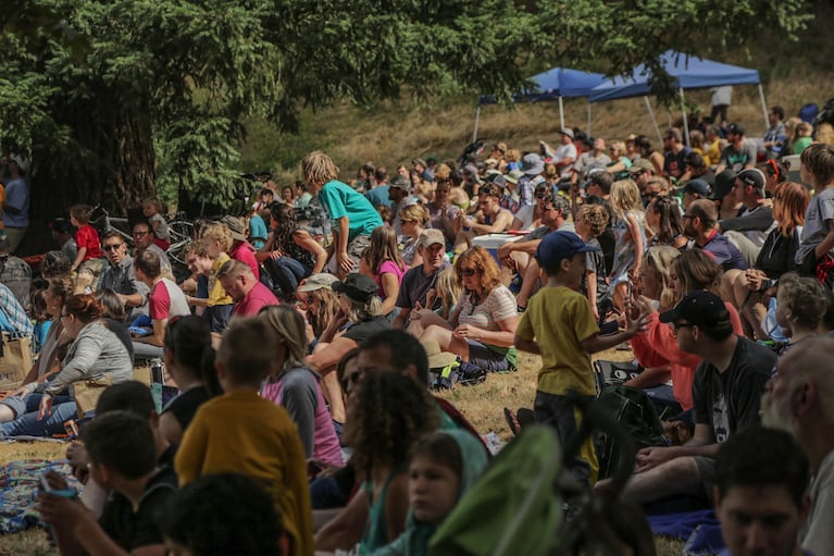 Crowds piled along the hillside to watch the event. Event organizers attempted to keep them at least 10 feet away from the track.