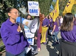 Unionized workers picket outside the Providence Community Health Centers on Oct. 12, 2023.