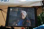 A photo of Clara Peoples, the nationally-recognized Mother of Juneteenth, hangs onstage at Portland's Juneteenth celebration.