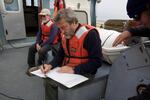 NOAA fisheries biologist, Curtis Roegner records scientific data on the health of crab populations. Low-oxygen levels have killed off large populations of crabs during hypoxia events in the past.