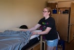 Paytyn Loyd makes her bed on move-in day. 
