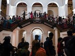 People visit Sri Lankan President Gotabaya Rajapaksa's official residence in Colombo on July 12, 2022, after it was overrun by anti-government protesters on July 9.