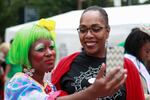 A woman dressed as a clown takes a selfie with Doris Rush, niece of Clara Peoples and Oregon State Director of the National Juneteenth Observance Foundation.