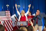 Republican candidate for Senate, U.S. Rep. Ashley Hinson (R-Iowa) celebrates on stage with her family during a primary night election party on June 2, 2026 in Cedar Rapids, Iowa. Hinson won the Republican nomination to fill the seat vacated by Sen. Joni Ernst.