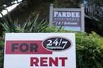 FILE-A "For Rent" sign is displayed outside an apartment building on May 21, 2025, in Portland, Ore. Portland City Councilors are considering a plan to temporarily waive some construction fees, aiming to boost new apartment development. 