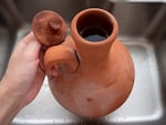 The golla is the Moroccan term for a clay pot that keeps water cool. Moroccans fill the pots and put them in most rooms in the house for the family to drink from — and set them up outside for community refreshment.