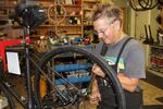 Bike mechanic Barb Bohm-Becker hopes Oregon’s $15 new bicycle tax will diffuse claims that cyclists don’t pay their share for infrastructure.