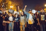 Portland activist and law student Gregory McKelvey, second from right, leads a march down Highway 99E on Thursday, Nov. 10, 2016.