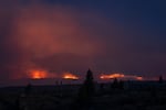 In this long exposure, the Bench Fire burns on the Warm Springs Reservation, seen from Culver, Ore., on July 27, 2026.