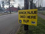 Erick Njue died Sunday, Jan. 25, 2026 on Patterson Street and East 22nd in Eugene, Ore. On Feb. 5, 2026, signs are posted along the street to remind passersby.