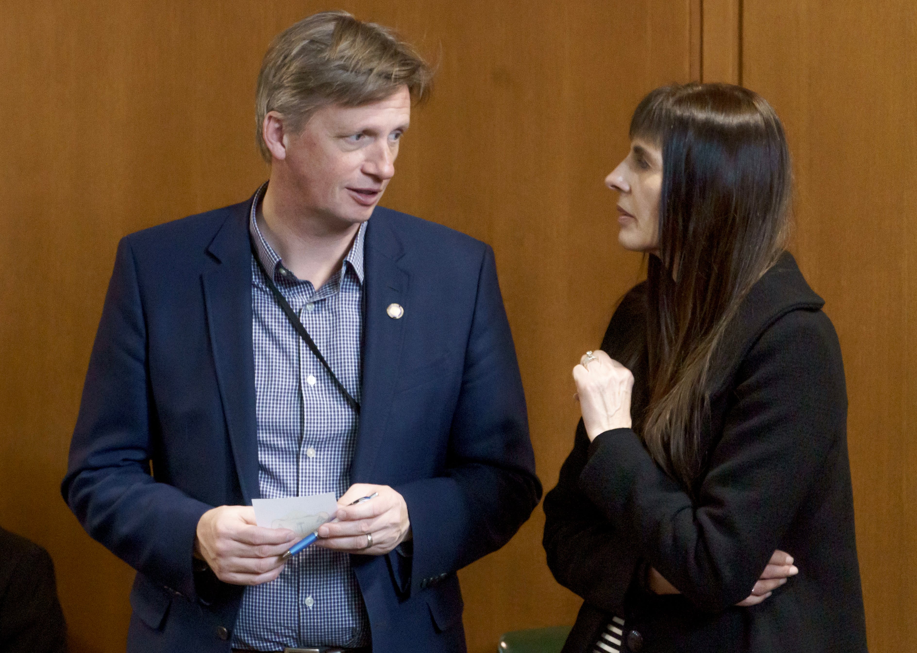 FILE: Rep. Jason Kropf, D-Bend, left, pictured in 203. Kropf was a key player in the gun legislation in the 2025 session.