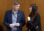 FILE: Rep. Jason Kropf, D-Bend, left, pictured in 203. Kropf was a key player in the gun legislation in the 2025 session. 