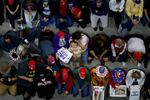 Supporters of former President Donald Trump attend a campaign rally at the Forum River Center March 9 in Rome, Ga.