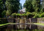 FILE: Lewis & Clark College reflecting pool and Frank Manor House.