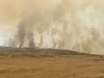 In this photo provided by InciWeb, the Durkee Fire is seen from Huntington Road in Eastern Oregon on Sunday, July 21, 2024.