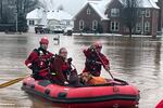 Clarksville Fire Rescue members perform water rescues to evacuate trapped people during flooding on Sunday in Clarksville, Tenn.