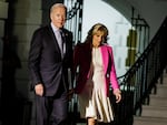 President Biden and first lady Jill Biden walk toward Marine One on the South Lawn of the White House on Nov. 7.