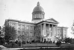 The Oregon State Capitol building of 1876. Carrie B. Shelton served as acting governor of Oregon from this building for roughly 49 hours in 1909. The building was destroyed by a fire on the night of April 25, 1935.