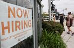 LOS ANGELES, CALIFORNIA - JUNE 02: A 'Now Hiring' sign is displayed outside a resale clothing shop on June 2, 2023 in Los Angeles, California. Today’s U.S. labor report shows that employers added 339,000 jobs in May with sectors including construction, healthcare, business services and transportation adding jobs with wages showing 4.3 percent growth over the same period last year. (Photo by Mario Tama/Getty Images)