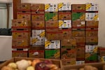 Food boxes sit stack before clients pick up food at One Life Food Pantry, located in Real Life Foursquare Church in Vancouver, Wash., on Nov. 1, 2025.