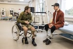 Ukrainian war veteran Oleksandr Budko (right) talks to an injured soldier, Mykola Kovalenko, 36, at the Recovery rehabilitation center in Kyiv, Ukraine, on Oct. 18.