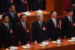 Chinese leaders and former leaders including Zhu Rongji (center) listen to The Internationale at the end of the closing session of the 19th Communist Party Congress at the Great Hall of the People in Beijing on Oct. 24, 2017.