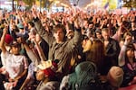 Protesters in Portland sat in a moment of silence honoring Michael Brown, an unarmed black man shot by police in Ferguson, Missouri.