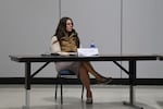 FILE: Casey Jackson, superintendent and principal of Siletz Valley School, listens on Oct. 24 as the school board votes to place her on paid administrative leave pending an investigation into complaints filed against her.