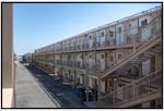 Camp Lemonnier uses stacks and rows of "Containerized Living Units,” or CLUs, which the military likens to shipping containers, to house thousands of personnel at the U.S. base in Djibouti. A group of migrants is being held in a converted shipping container, according to court filings.