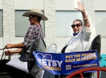 Independent gubernatorial candidate Betsy Johnson waves to crowds at the Pendleton Round-Up in September 2022.