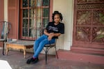 Kim Owens poses for a portrait on her front porch in Jackson, Miss.