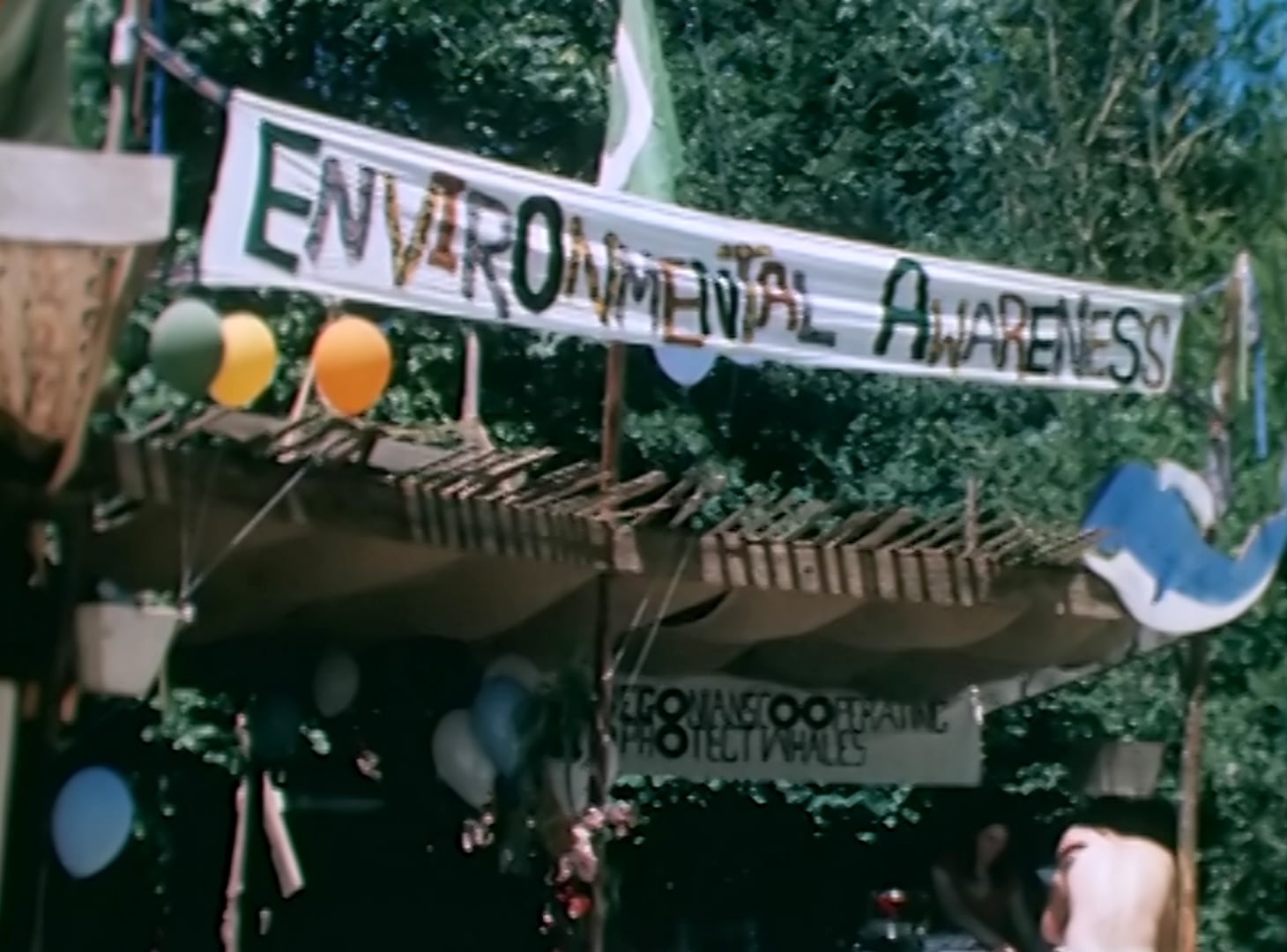 In this screenshot of an archive video from July 1977, a banner promoting environmental stewardship on display at the Oregon Country Fair. “I think the fair had a big part of bringing that consciousness to the mainstream,” said event manger Mark Malaska.