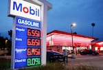 Gas prices are displayed at a Mobil gas station on March 30, 2026 in Pasadena, California. The average price of one gallon of regular self-service gasoline rose to $5.99 today in Los Angeles County, climbing from $4.69 one month ago, amid the ongoing war with Iran.