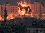 A fireball erupts during Israeli bombardment in the northern Gaza Strip on October 14. On Oct. 7, Palestinian Hamas militants entered Israel in a surprise attack, killing 1,400 Israelis and kidnapping at least 240 others. More than 10,000 Palestinians have been killed since Israel launched its attack in the Gaza Strip. (Photo by ARIS MESSINIS/AFP via Getty Images)