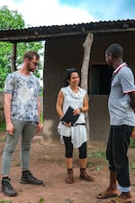 Durabali, Guinea-Bissau (September 24, 2024) - James Keirle and Dr. Sirio Canos-Donnay prepare to present the archeological text findings to residents of Durabali.