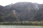 The patchwork of wildfire damage surrounding Multnomah Falls is easily visible from the Columbia River.